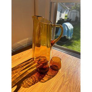 Vintage art glass amber drinking pitcher and shot glasses - mismatched set